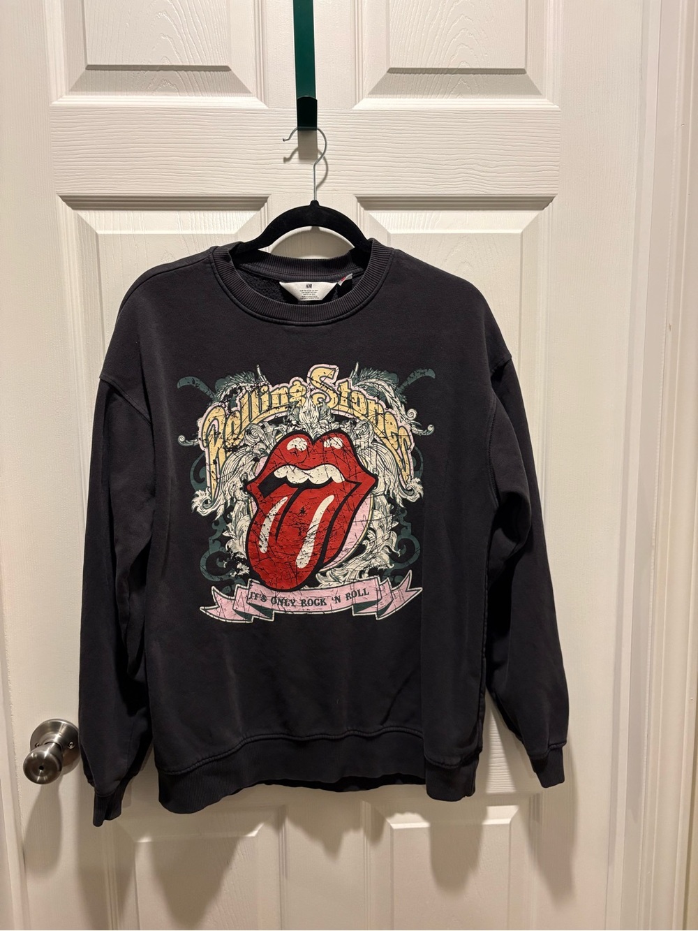 the Rolling Stones Black Crewneck with Red Tongue Graphic and Cream Accents